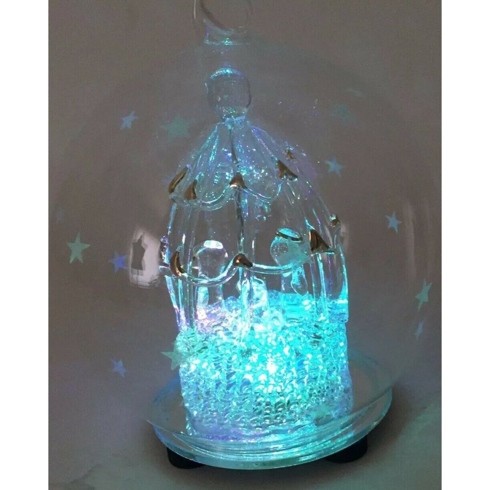 Nativity Blown Glass Ornament Gold Stars Color Changing Light Up Globe 4.5 in.